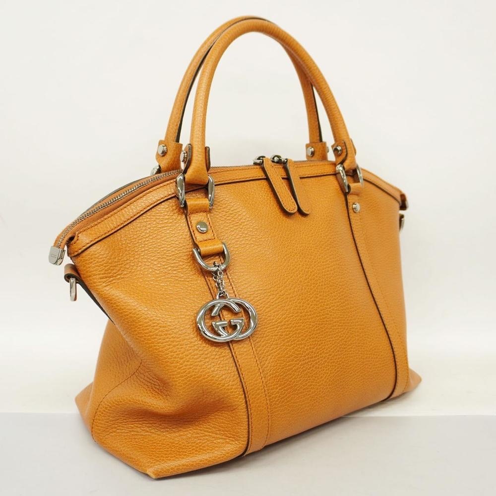 GUCCI Pebbled Calfskin GG Charm